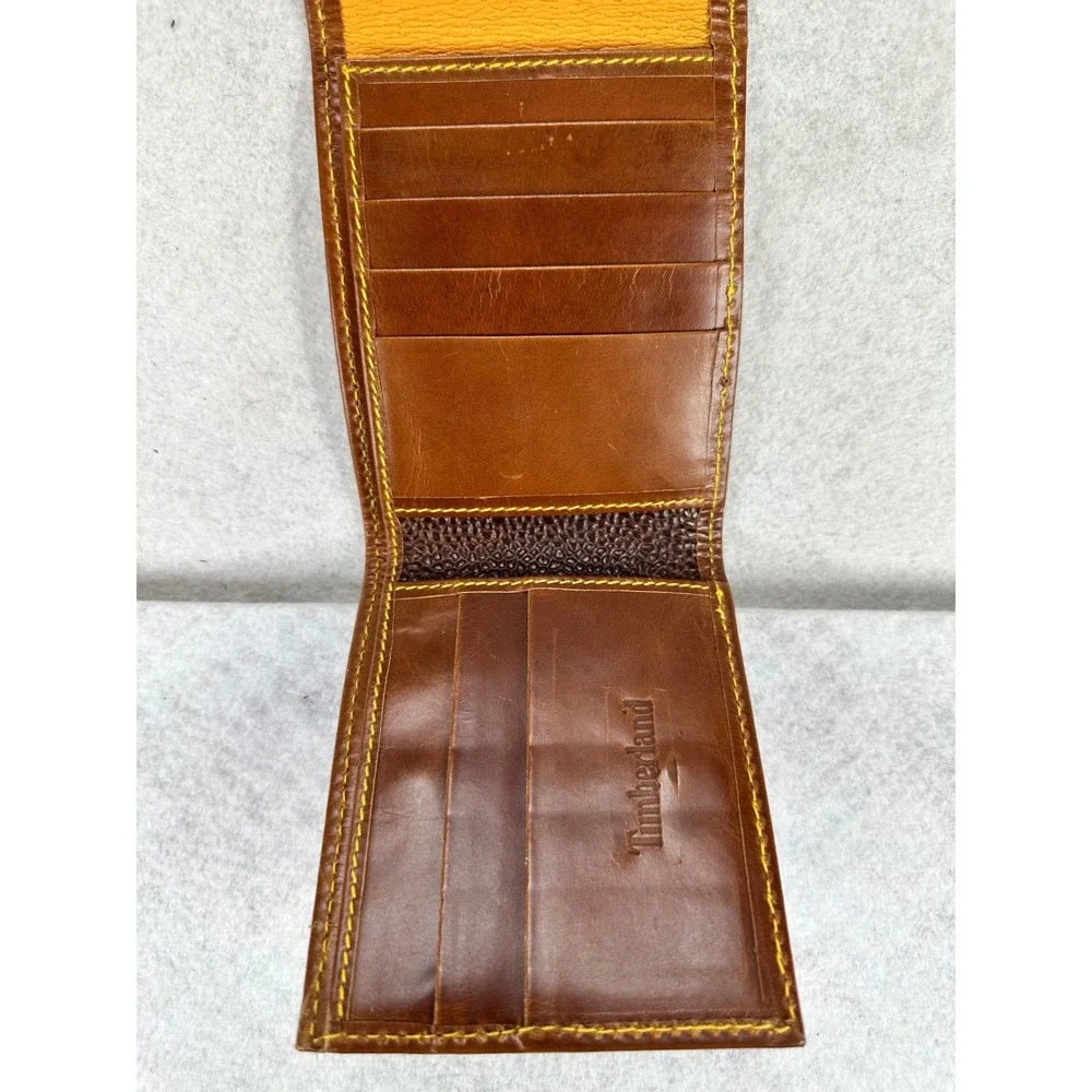 Timberland Mens Brown Pebbled Leather Bifold Wallet Yellow Stitch Snap Closure